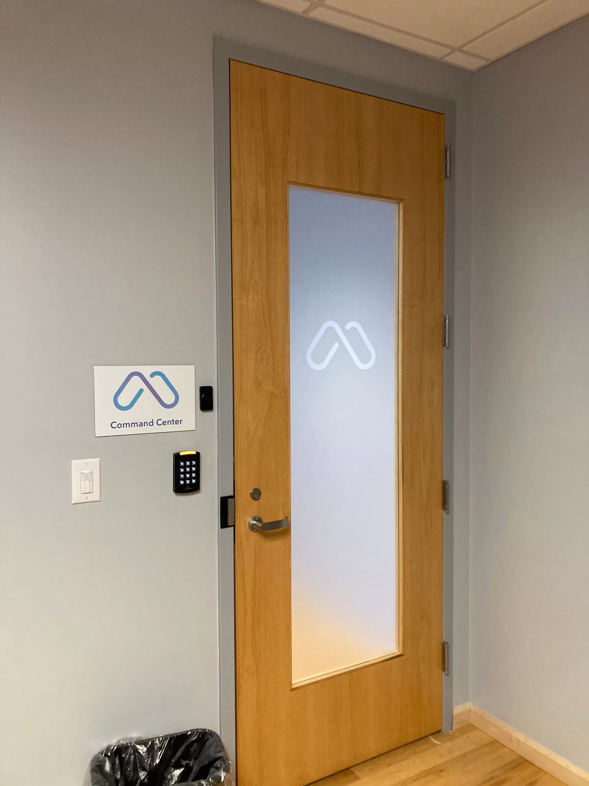 Frosted Vinyl And Cut Logo On Glass Door