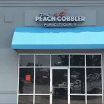 Illuminated Channel Letters Of Peach Cobbler